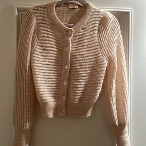Gently worn sweater. Size M. Cream colored.Mohair and nylon.